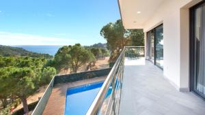 a balcony with a view of the ocean at 2Sant - Lloret de Mar in Lloret de Mar