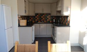 A cozinha ou kitchenette de Ballyvaughan Cottages