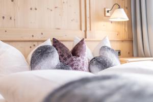Łóżko lub łóżka w pokoju w obiekcie Wellnessappartements Margit