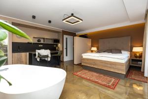 Voodi või voodid majutusasutuse Apartmány U Vinice toas
