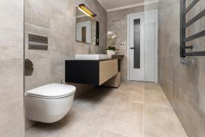 Vannituba majutusasutuses Apartmány U Vinice
