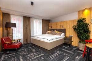 Postel nebo postele na pokoji v ubytování Apartmány U Vinice