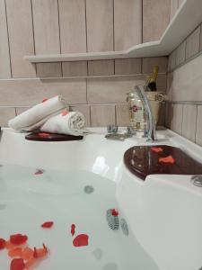 a bathroom with a sink with debris on the floor at Hotel Garden Napoli in Naples