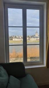 Гостиная зона в "Gîte les fûtreaux" vue sur Loire & linge inclus