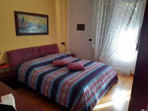 Postel nebo postele na pokoji v ubytování Andreis Apartments