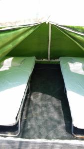 Postel nebo postele na pokoji v ubytování Camping Paleochora