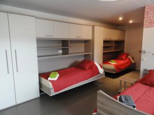 Giường trong phòng chung tại B&B Altijd Genieten