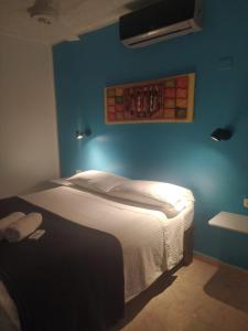 Postel nebo postele na pokoji v ubytování Hotel Pedernales Italia Republica Dominicana