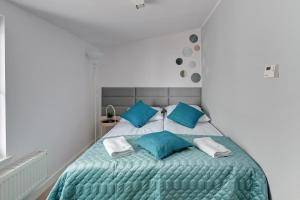 Posteľ alebo postele v izbe v ubytovaní Apartamenty Haffnera by Grand Apartments