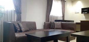 Χώρος καθιστικού στο Comfy & Spacious Apartments