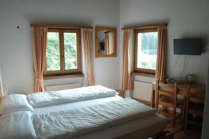 Postel nebo postele na pokoji v ubytování Hotel Restaurant Walserhof + 37 fotografií