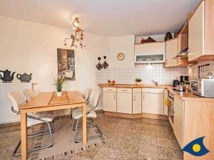 Kuchyň nebo kuchyňský kout v ubytování Dünen-Residenz C 08