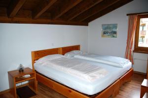 Postel nebo postele na pokoji v ubytování Hotel Restaurant Walserhof