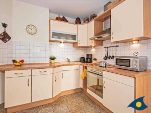 Kuchyň nebo kuchyňský kout v ubytování Dünen-Residenz C 08 + 11 fotografií