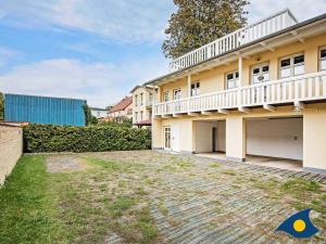an empty yard in front of a house at Villa Livia Whg 01 in Ahlbeck