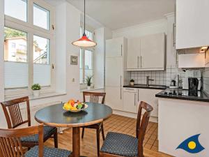 Kuchyň nebo kuchyňský kout v ubytování Villa Sonnenschein Whg 03 + 5 fotografií