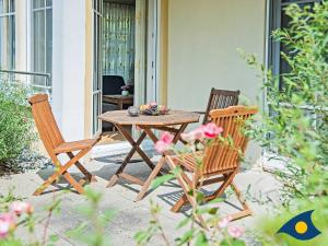Ein Garten an der Unterkunft Villen am Goethepark, Villa Christiane, Whg. 04 - Lena