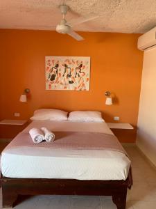 Postel nebo postele na pokoji v ubytování Hotel Pedernales Italia Republica Dominicana