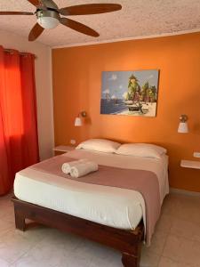 Postel nebo postele na pokoji v ubytování Hotel Pedernales Italia Republica Dominicana