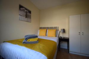 Postel nebo postele na pokoji v ubytování Prime Location Apartment