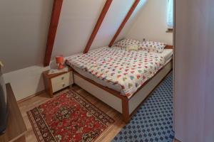 Кровать или кровати в номере Kuća za odmor Rukova Hiža