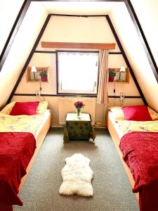Postel nebo postele na pokoji v ubytování Hotel a Penzion PEGAS