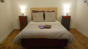 Кровать или кровати в номере La Vigneronne
