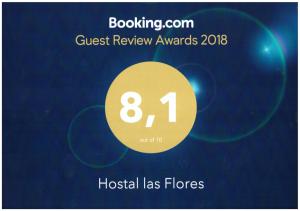 un cartel que lee los premios de revisión de invitados Houston las flores en Hostal Las Flores Ramblas, en Barcelona