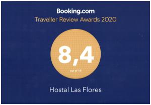 una señal que lee los premios de revisión de viajes con el número en Hostal Las Flores Ramblas, en Barcelona