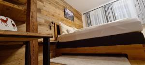 Letto o letti in una camera di Frühstückspension Bachseitenhof