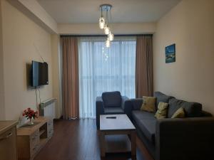 Televiisor ja/või meelelahutuskeskus majutusasutuses Pride Properties welcomes you at 17 Buzant St 11-166 Yerevan Armenia