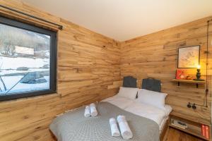 Säng eller sängar i ett rum på Kazbegi cabins