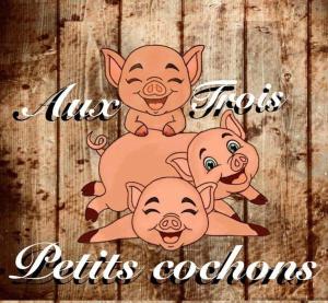 Aux trois petits cochons في هوتون: ثلاثة خنازير على سياج خشبي مع الكلمات ana غازل الألوان