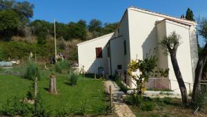 a view of the house from the garden at I Pesci nel golfo di Baratti in Baratti
