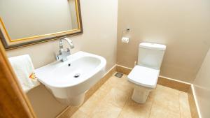 Koupelna v ubytování Villa Karibu Serviced Apartments-Kampala