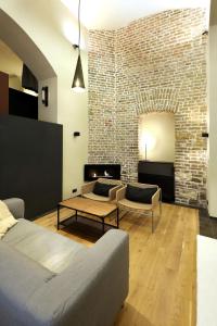 Posezení v ubytování American Loft in the Heart of Prague