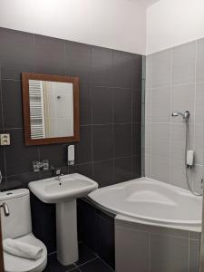 Koupelna v ubytování Garni Hotel Cosmopolitan