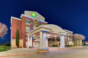 a hotel with a sign on the front of it at Holiday Inn Express Lake Worth NW Loop 820 by IHG in Fort Worth