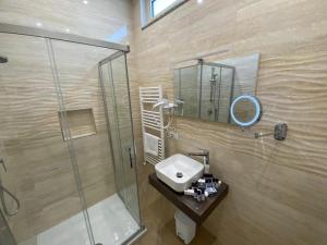 Ванная комната в ESPERIA B&B