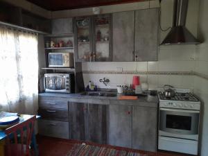 Nhà bếp/bếp nhỏ tại Cabaña La Perli +2 ảnh