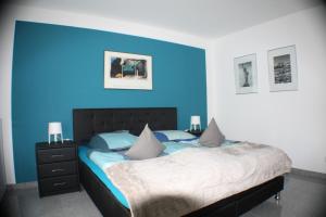 Un pat sau paturi într-o cameră la Apartment 60 m² in Elsdorf-Heppendorf