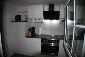 Kuchyň nebo kuchyňský kout v ubytování Apartment 60 m² in Elsdorf-Heppendorf