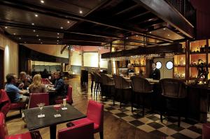Um restaurante ou outro lugar para comer em Hotel Posada Los Alamos