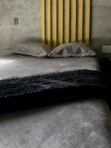 Кровать или кровати в номере Türk