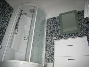 a shower in a bathroom with a mirror and a sink at B&B La Terrazza Sul Mare Taormina in Taormina +37 photos