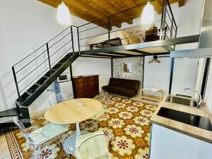 Kuchyň nebo kuchyňský kout v ubytování Palazzo Lupicini Affittacamere