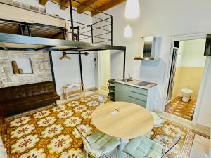 Postel nebo postele na pokoji v ubytování Palazzo Lupicini Affittacamere