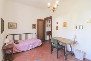 Ένα ή περισσότερα κρεβάτια σε δωμάτιο στο Villa Elena