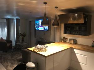 Nhà bếp/bếp nhỏ tại River Coquet Luxury Hot Tub Retreat