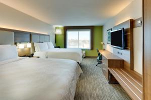 Postel nebo postele na pokoji v ubytování Holiday Inn Express Lake Worth NW Loop 820 by IHG